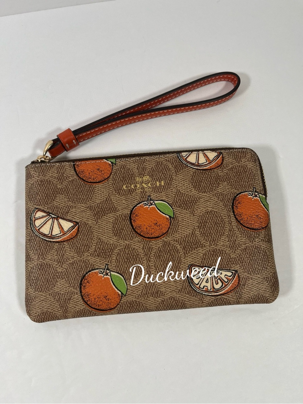 NWT Coach Corner Zip Wristlet In Signature Canvas With Orange Print